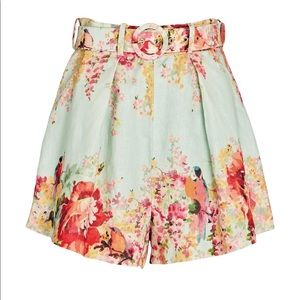 Belted shorts. High waisted. Back zip closures.